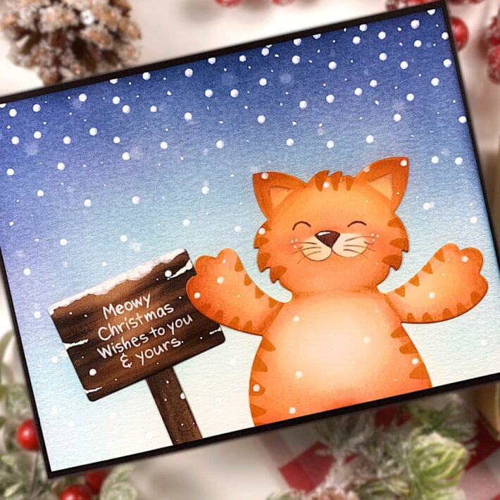 https://spellbinderspaperarts.com/cdn/shop/files/Jennifer-Rustioni-_-2023-_-Stampendous-Hugs-_-Meowy-Christmas-2-710x710_710x710.jpg?v=1700603828