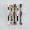 DMC Color Essentials Floss Bundle Neutrals 5 Pack (SCS-256) marble grey background. 